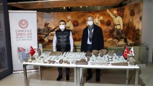 Pulluğa takılan savaş malzemelerini müzeye bağışladı